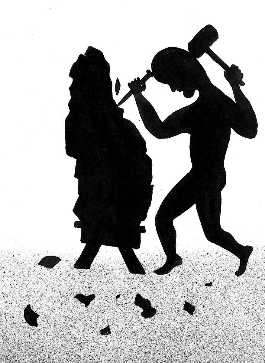 Black silhouette of a man carving into a rough, jagged stone block with a hammer and chisel, small chips scattered on the ground.