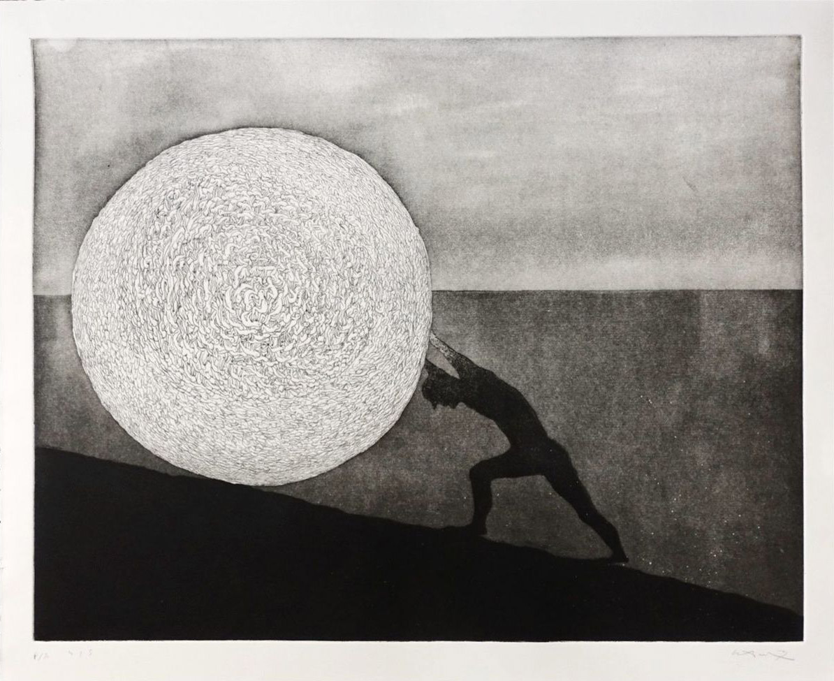 Black and white etching of a dark nude figure pushing a huge pale sphere, covered in fine swirling line texture, up a black slope, against a grey sky and flat sea horizon, with edition number and signature in pencil below.