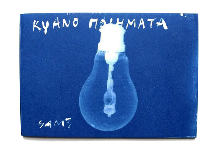 Blue booklet cover titled in Greek "ΚΥΑΝΟ ΠΟΙΗΜΑΤΑ" with a cyanotype image of a lightbulb with a dripping filament, "SAM3" signed in the corner.