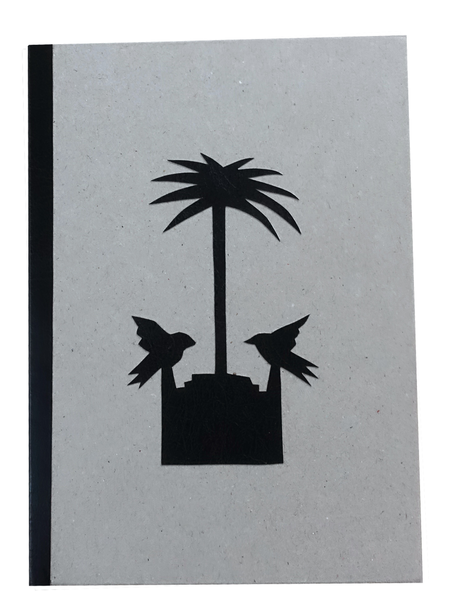 Front cover of a hardbound book in speckled grey board with a black spine, showing a black cut-out silhouette of a palm tree rising from a stepped block flanked by two birds with raised wings.